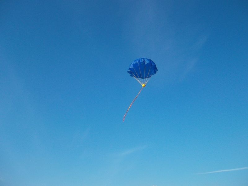 Hand-thrown parachute toy